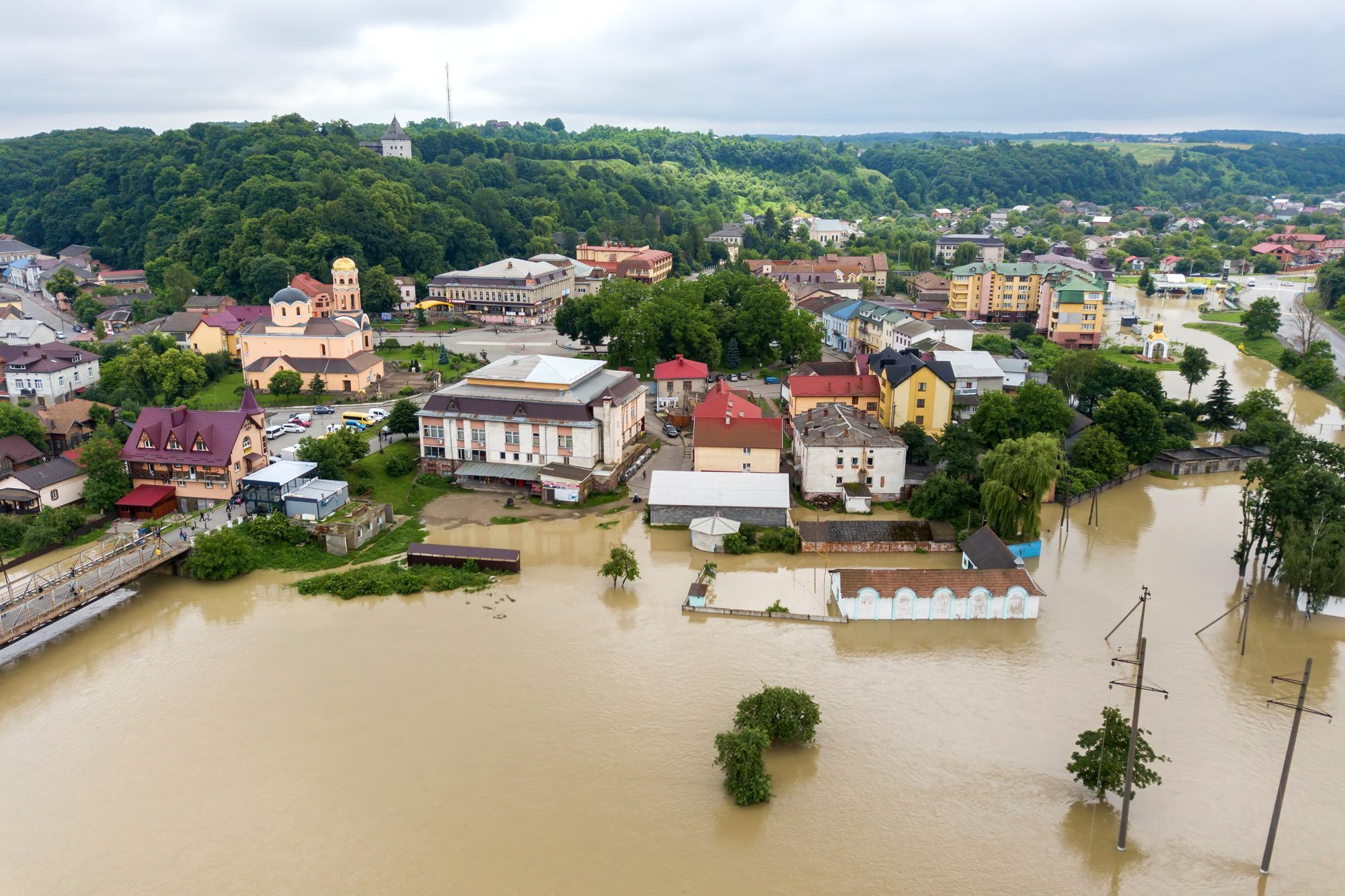 Aerial view of flooded houses with dirty water of Dnister river